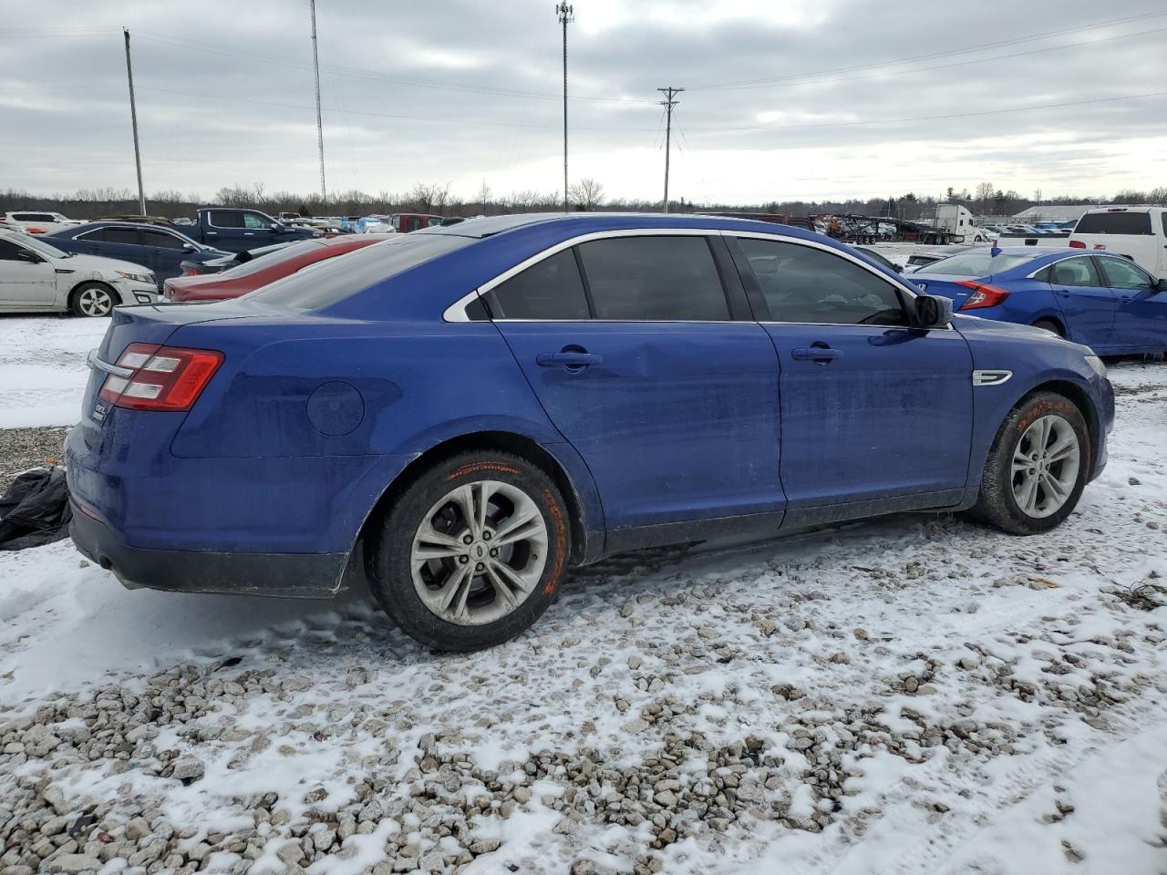 2015 Ford Taurus VIN 1FAHP2H85FG149725 Copart auction photo, front end / side damage thumbnail 3