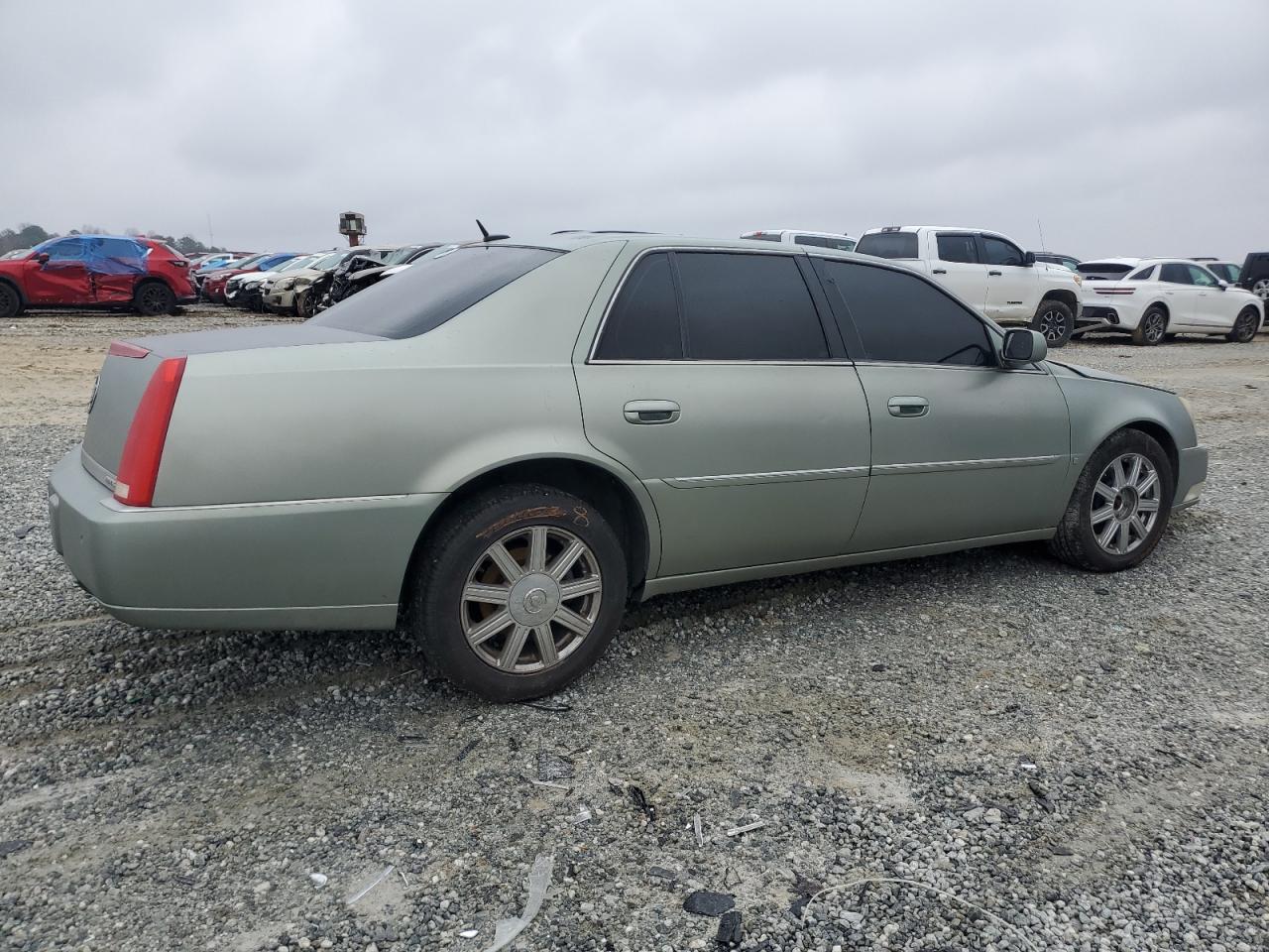 2006 Cadillac DTS VIN 1G6KD57YX6U193025 Copart auction photo, all over damage thumbnail 3