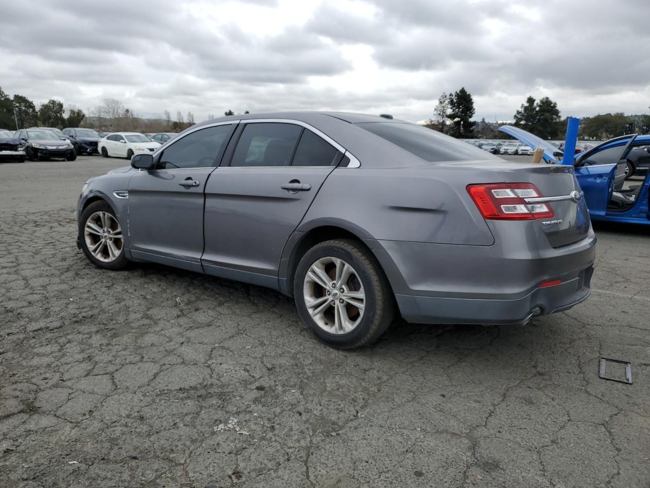 2014 Ford Taurus VIN 1FAHP2E87EG137966 Copart auction photo, front end / all over damage thumbnail 2