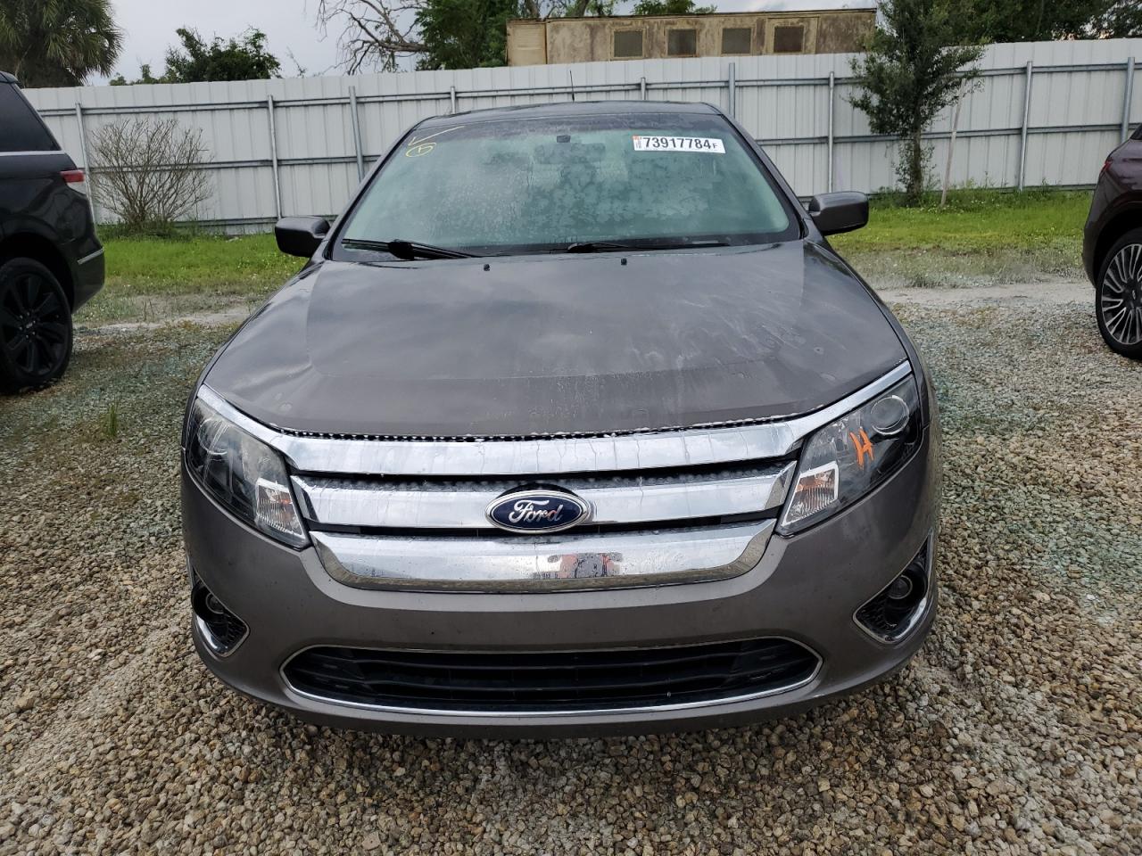2012 Ford Fusion VIN 3FAHP0JA4CR235386 Copart auction photo, water/flood damage thumbnail 5