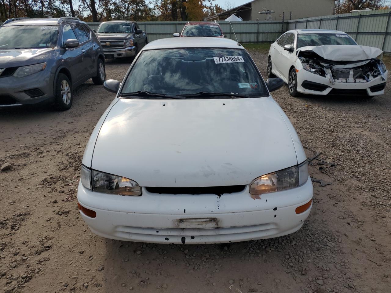 1996 GEO Prizm VIN 1Y1SK5261TZ028032 Copart auction photo, normal wear / minor dent/scratches damage thumbnail 5