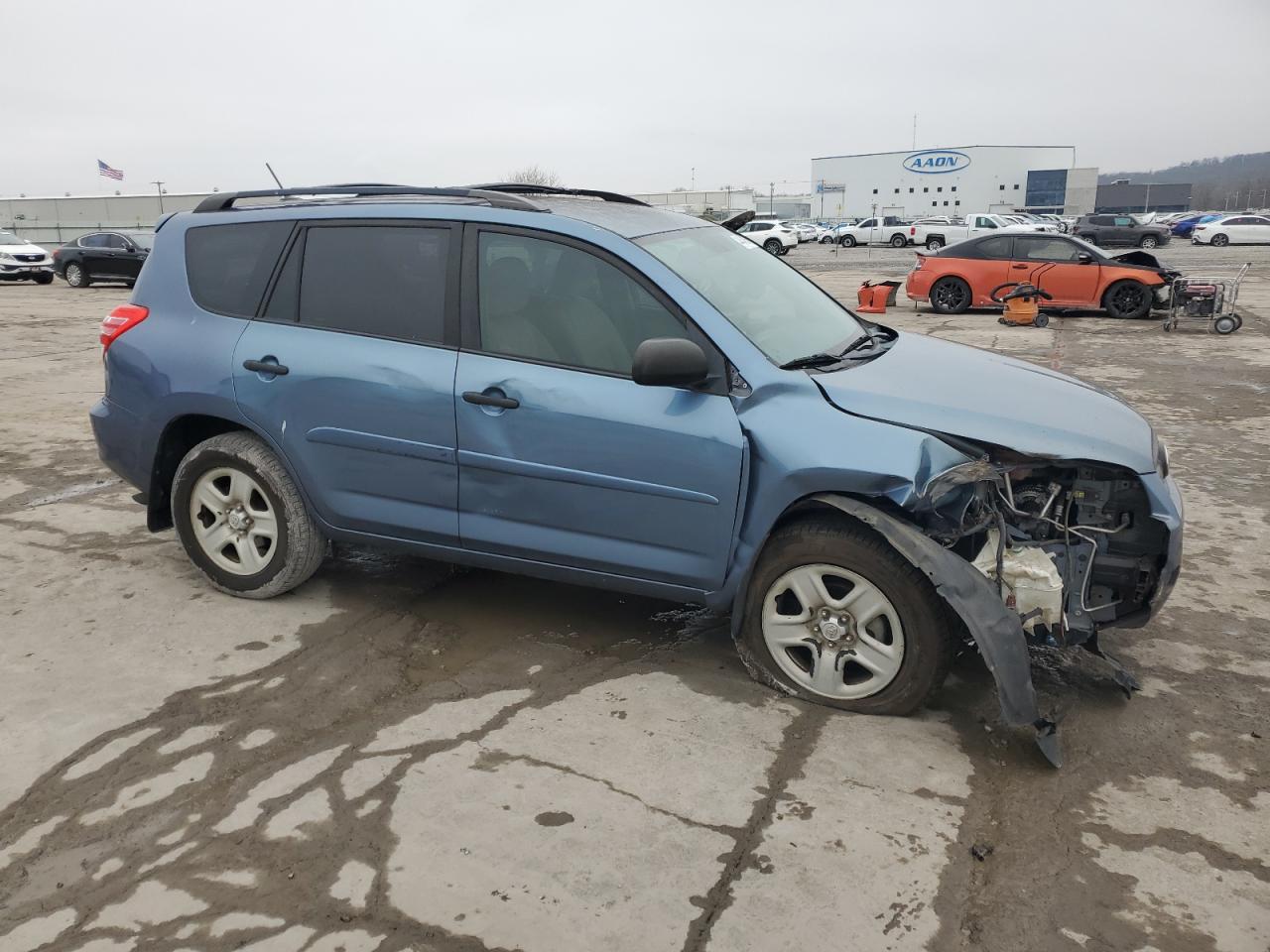 2011 Toyota RAV 4 VIN 2T3ZF4DV1BW084668 Copart auction photo, front end / side damage thumbnail 4