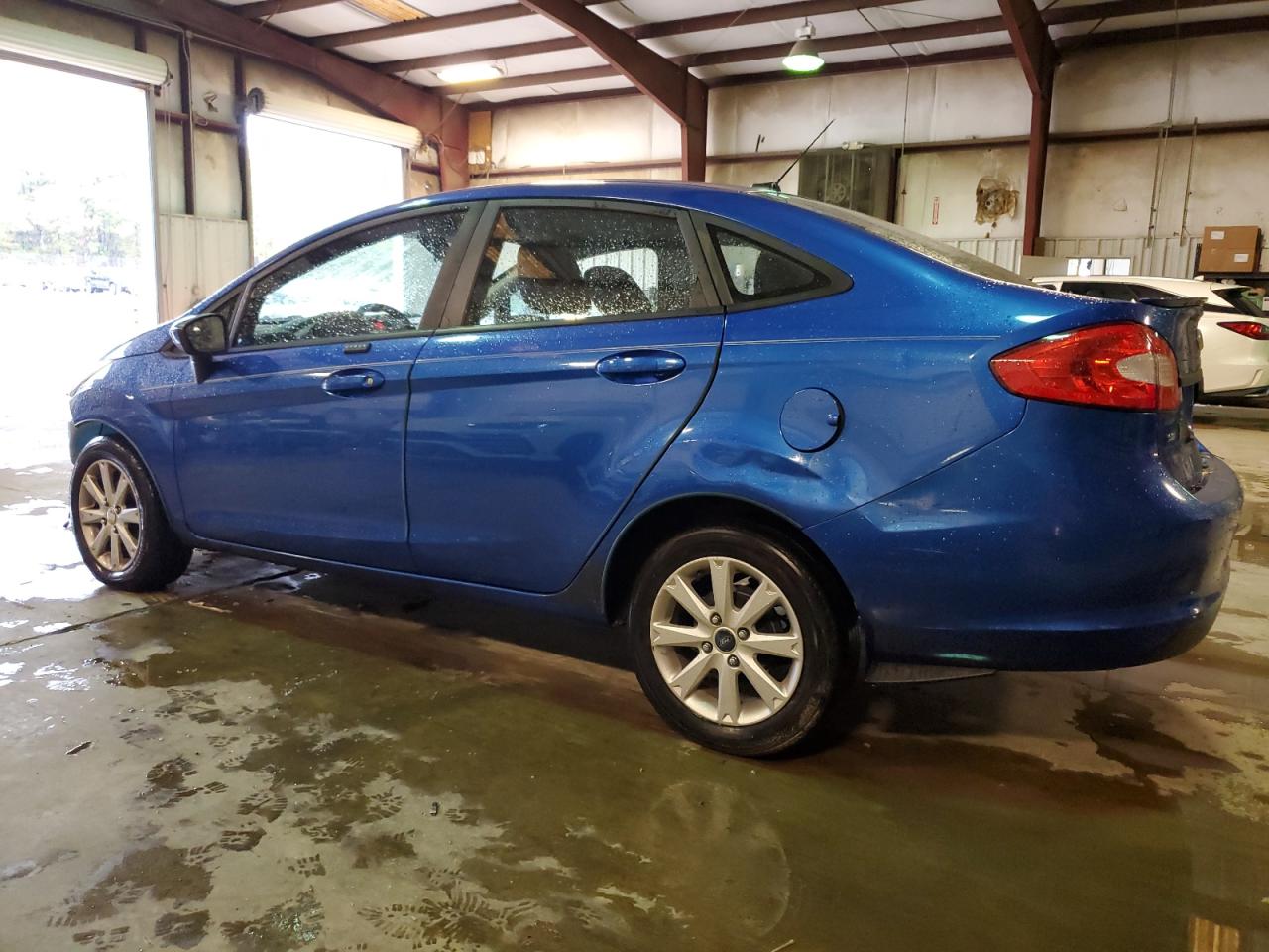 2011 Ford Fiesta VIN 3FADP4BJ9BM111291 Copart auction photo, front end / rear end damage thumbnail 2