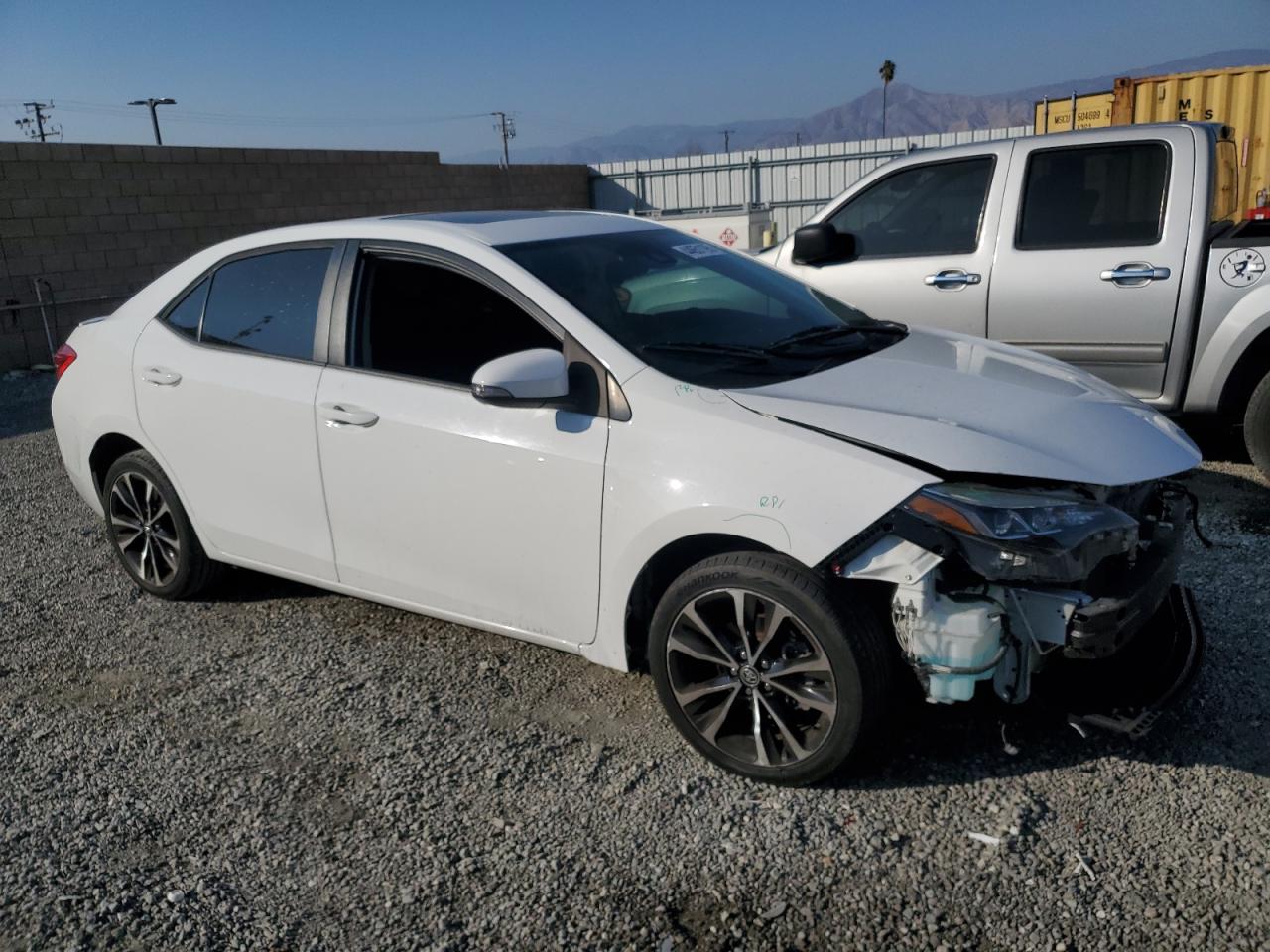 2019 Toyota Corolla VIN 5YFBURHE4KP932177 Copart auction photo, front end / side damage thumbnail 4