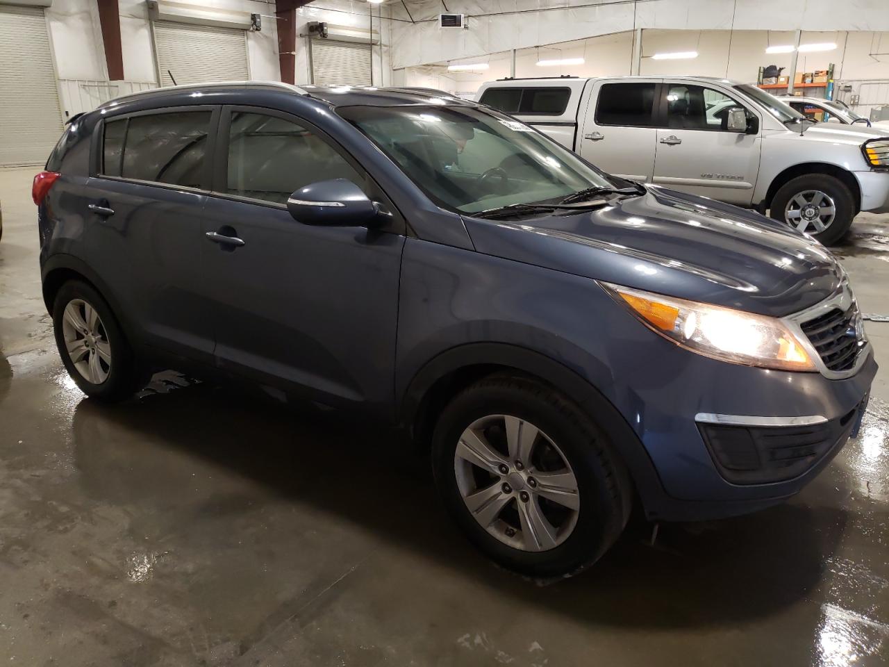 2012 KIA Sportage VIN KNDPB3A22C7347271 Copart auction photo, front end / side damage thumbnail 4