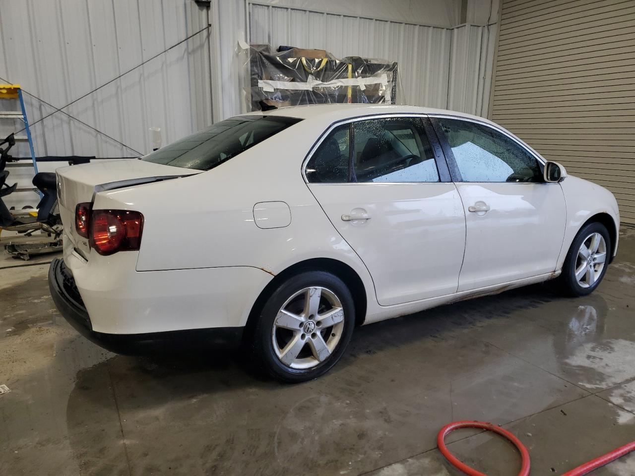 2009 Volkswagen Jetta VIN 3VWRZ71K29M179459 Copart auction photo, rear end damage thumbnail 3