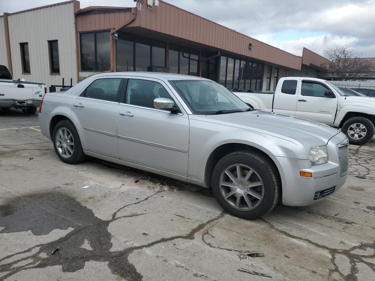 2010 Chrysler 300 VIN 2C3CK5CV6AH181764 Copart auction photo, side damage thumbnail 4