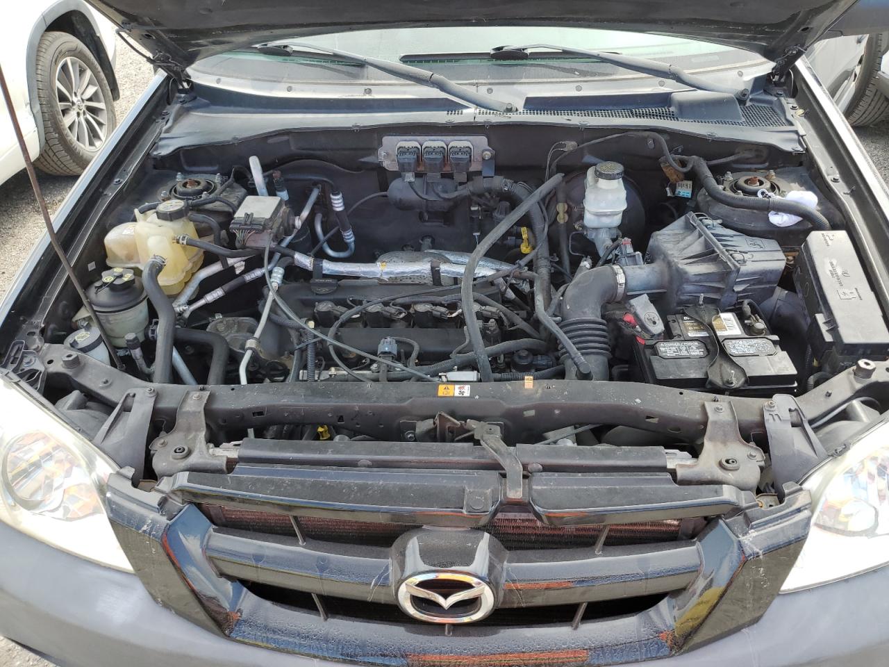 2005 Mazda Tribute VIN 4F2YZ02Z05KM51509 Copart auction photo, water/flood damage thumbnail 12