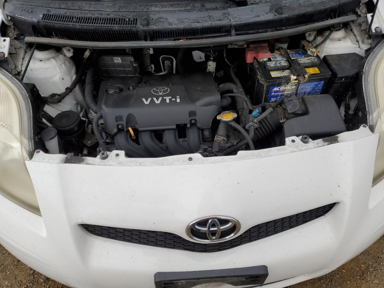 2009 Toyota Yaris VIN JTDKT903795261219 Copart auction photo, side damage thumbnail 12