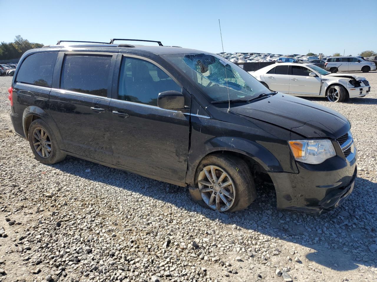 2019 Dodge Caravan VIN 2C4RDGCG1KR771850 Copart auction photo, side / top/roof damage thumbnail 4