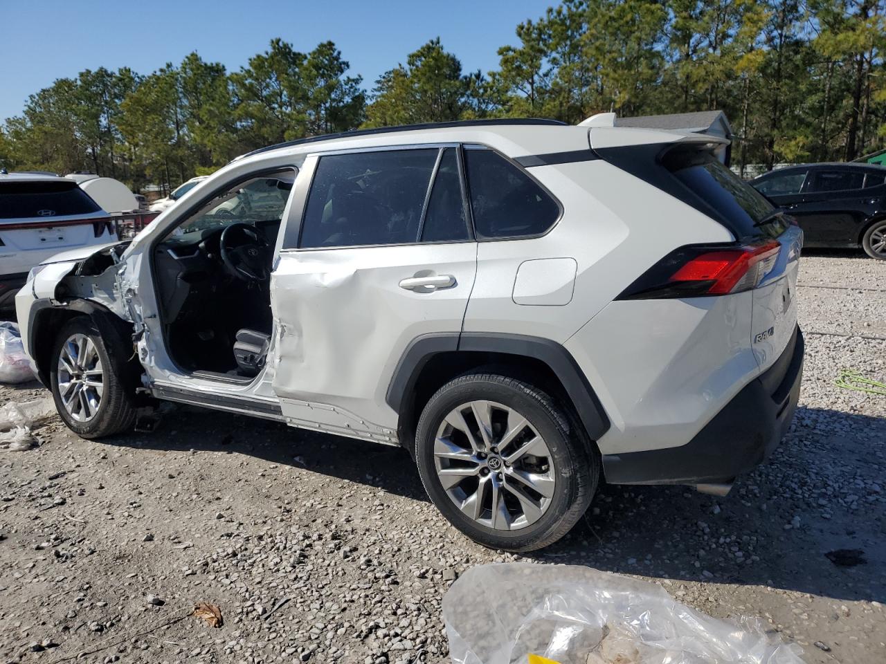 2021 Toyota RAV 4 VIN 2T3C1RFV4MW149515 Copart auction photo, side damage thumbnail 2