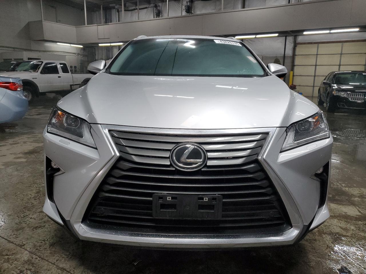 2017 Lexus RX VIN 2T2BZMCA4HC134338 Copart auction photo, rear end / hail damage thumbnail 5