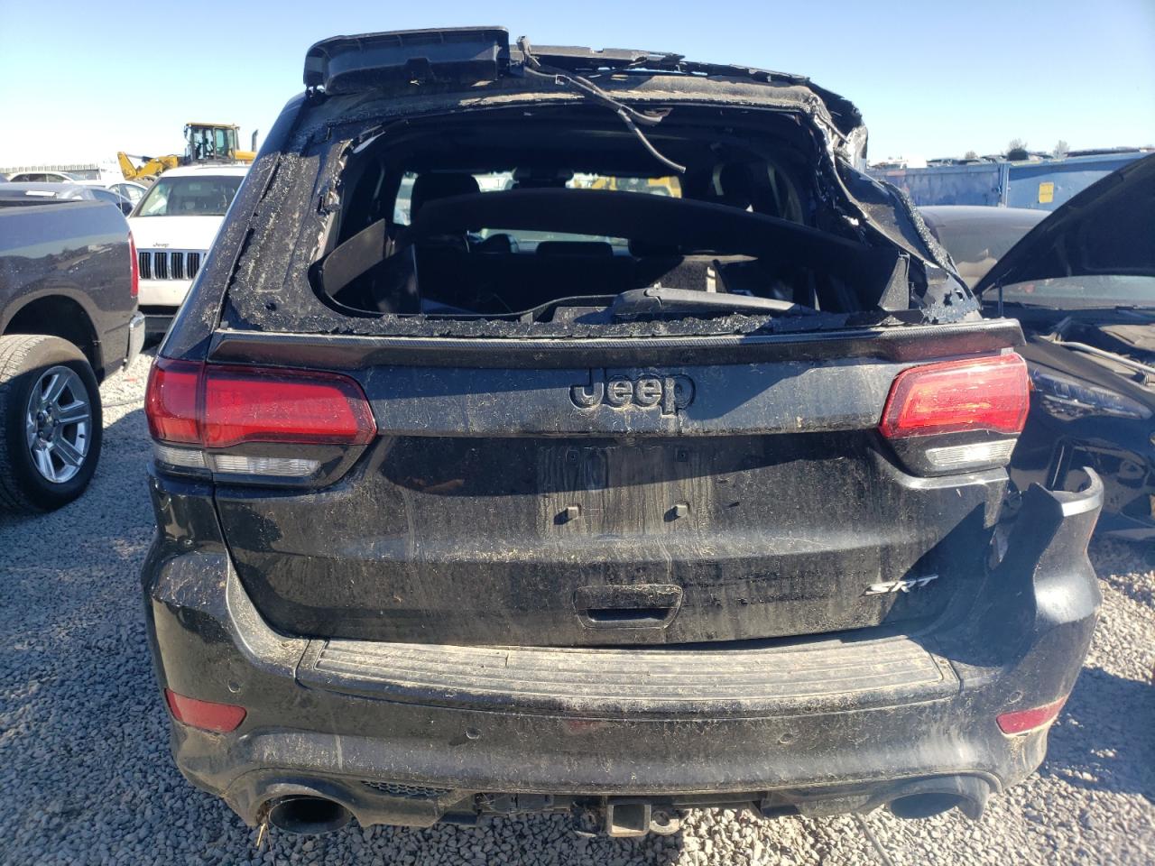 2015 Jeep Grand Cherokee VIN 1C4RJFDJ5FC713512 Copart auction photo, side damage thumbnail 6