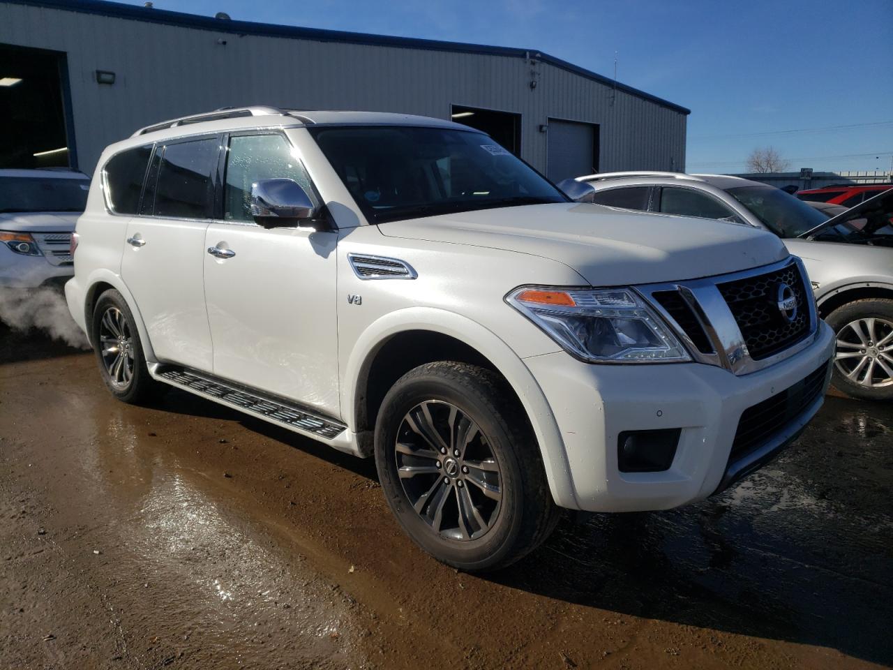 2019 Nissan Armada VIN JN8AY2NE9K9758483 Copart auction photo, front end / side damage thumbnail 4