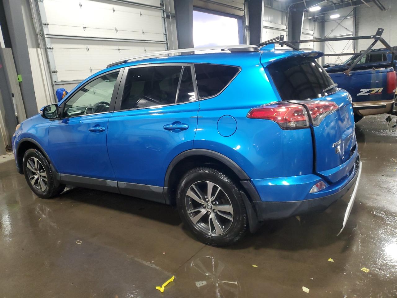 2016 Toyota RAV 4 VIN 2T3RFREV1GW504142 Copart auction photo, rear end damage thumbnail 2