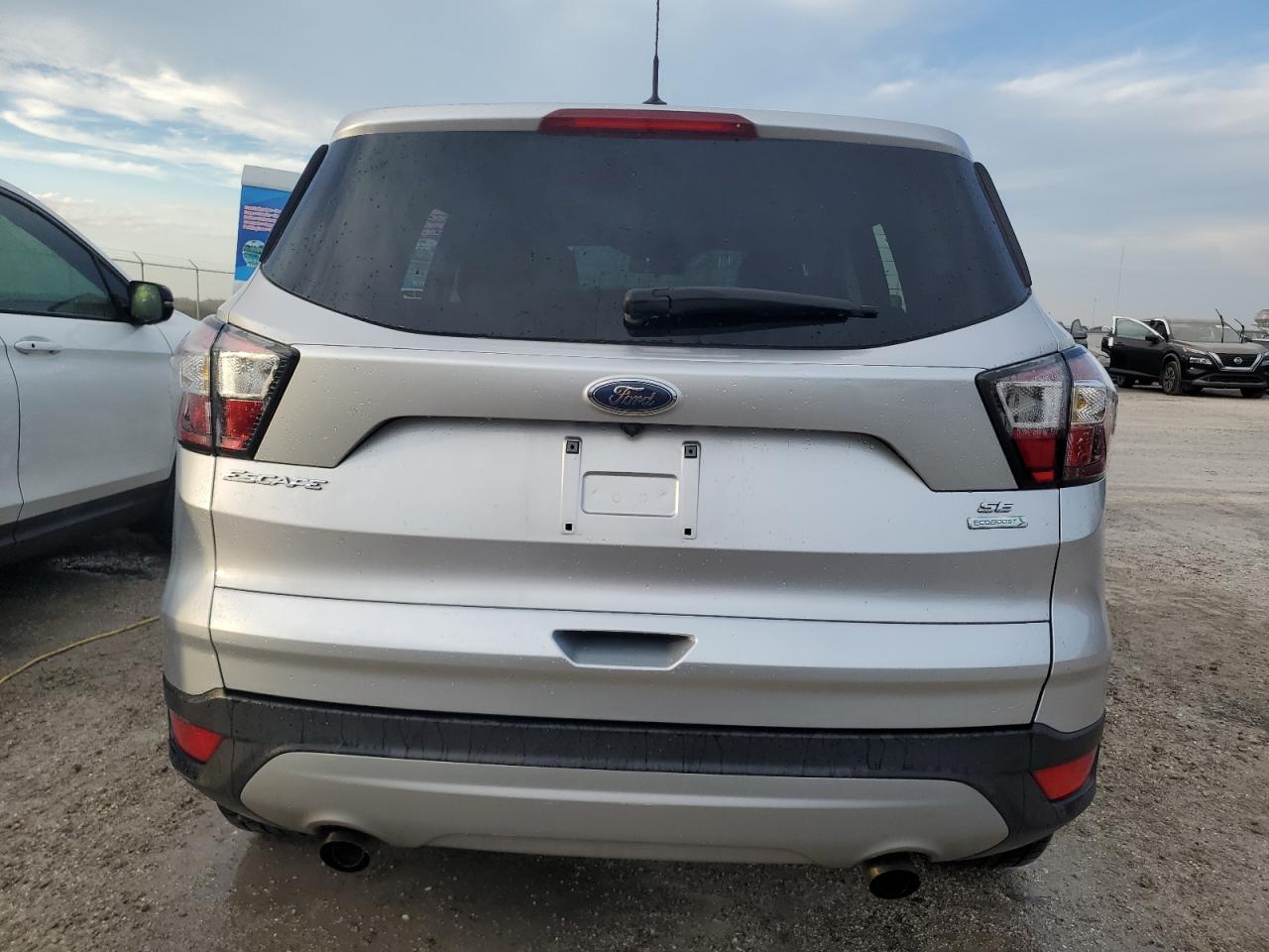 2017 Ford Escape VIN 1FMCU0GD7HUB19691 Copart auction photo, water/flood damage thumbnail 6