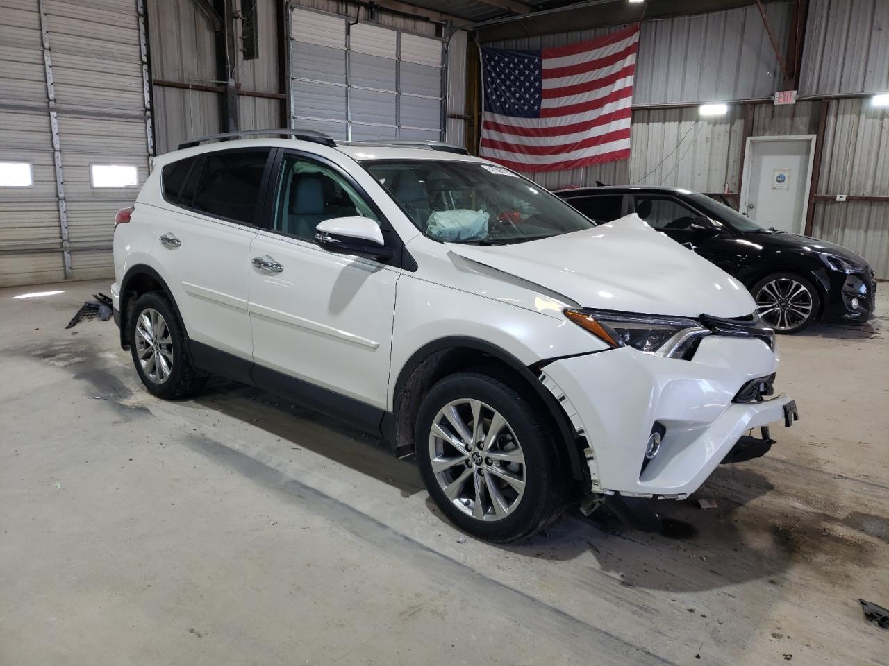 2018 Toyota RAV 4 VIN 2T3DFREV1JW848085 Copart auction photo, front end / side damage thumbnail 4