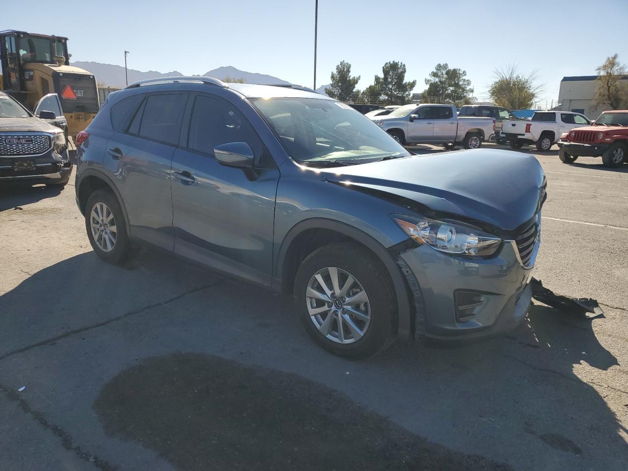 2016 Mazda CX-5 VIN JM3KE2BY2G0685094 Copart auction photo, front end / mechanical damage thumbnail 4