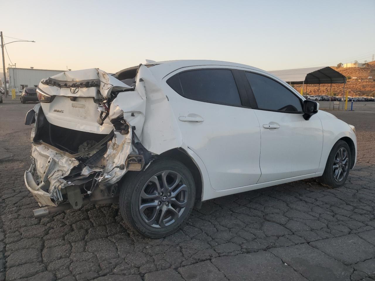2019 Toyota Yaris VIN 3MYDLBYVXKY503503 Copart auction photo, rear end / side damage thumbnail 3