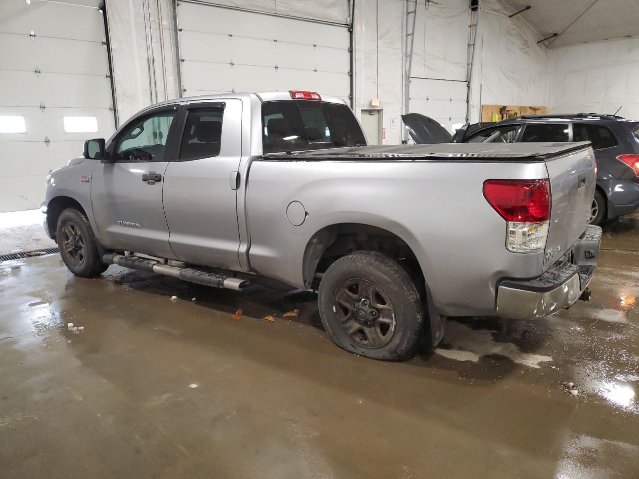2012 Toyota Tundra VIN 5TFUY5F13CX228853 Copart auction photo, side / mechanical damage thumbnail 2