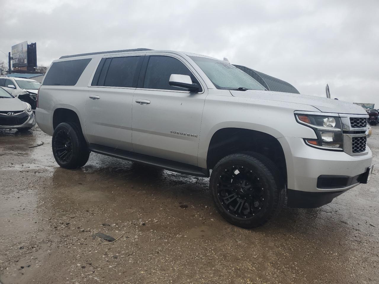 2016 Chevrolet Suburban VIN 1GNSKHKC1GR257416 Copart auction photo, minor dent/scratches damage thumbnail 4