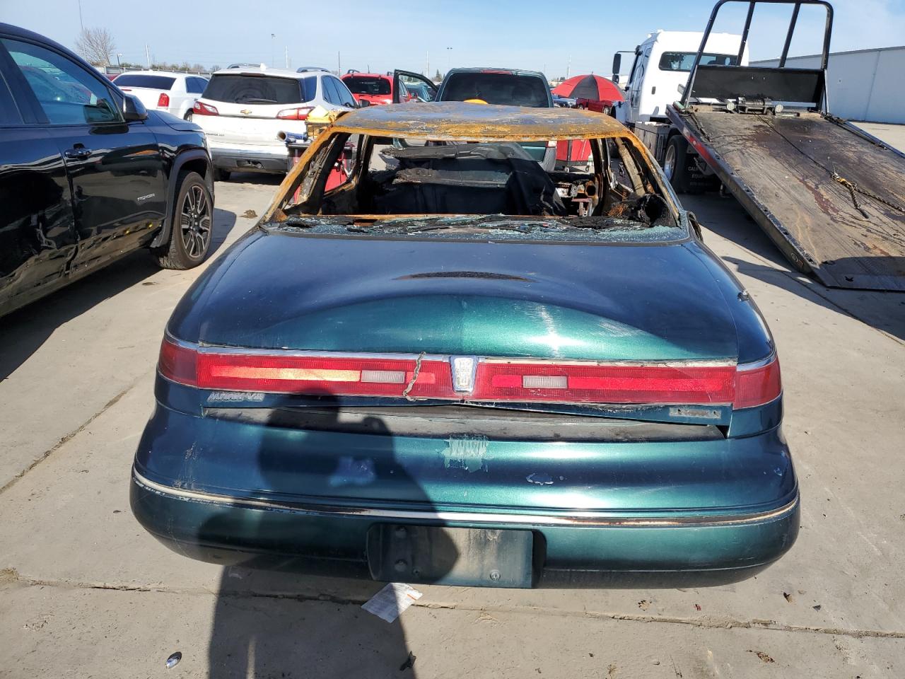 1993 Lincoln Mark VIII VIN 1LNLM91V8PY718757 Copart auction photo, burn damage thumbnail 6