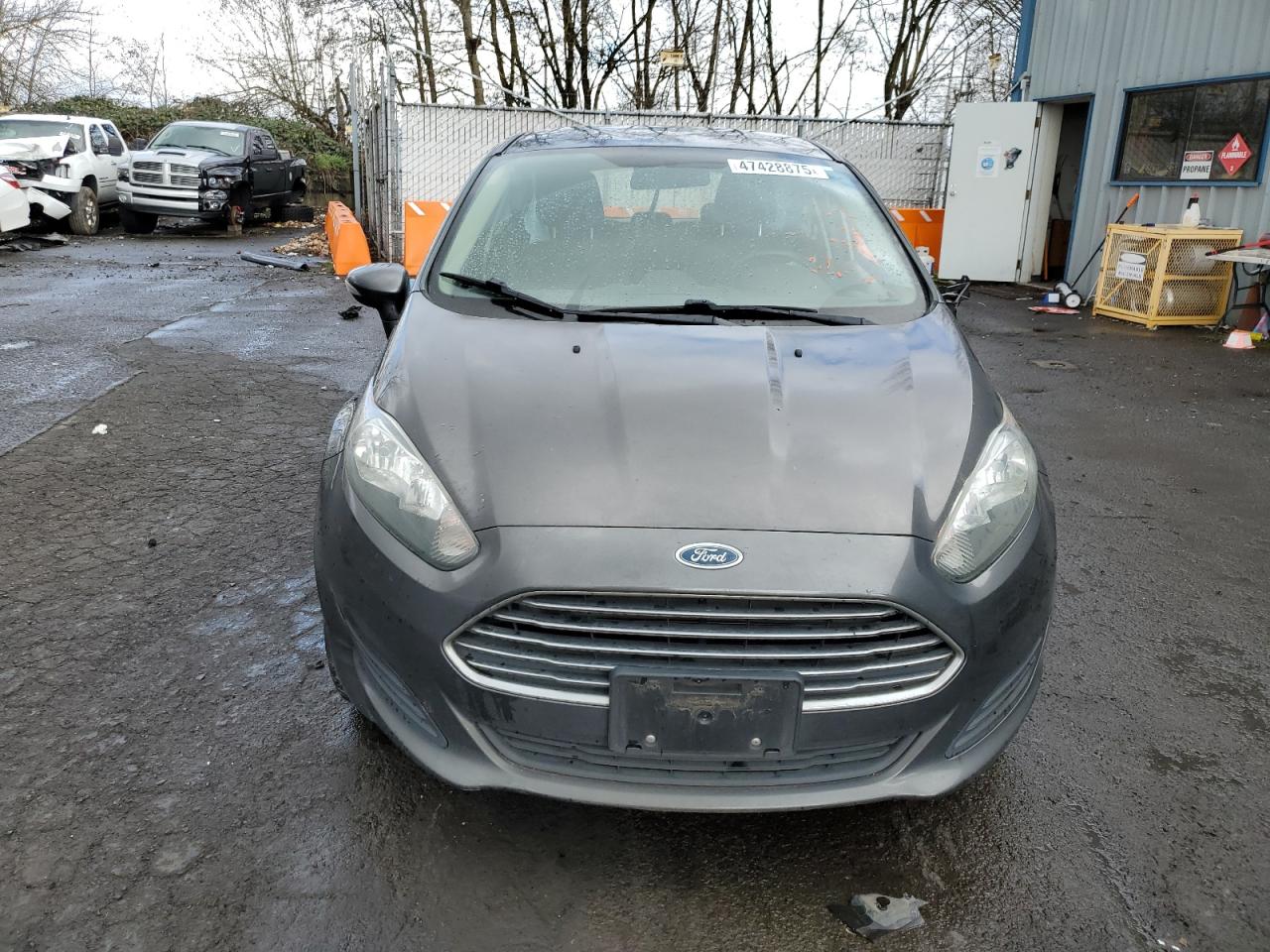 2015 Ford Fiesta VIN 3FADP4EJ9FM105962 Copart auction photo, side damage thumbnail 5
