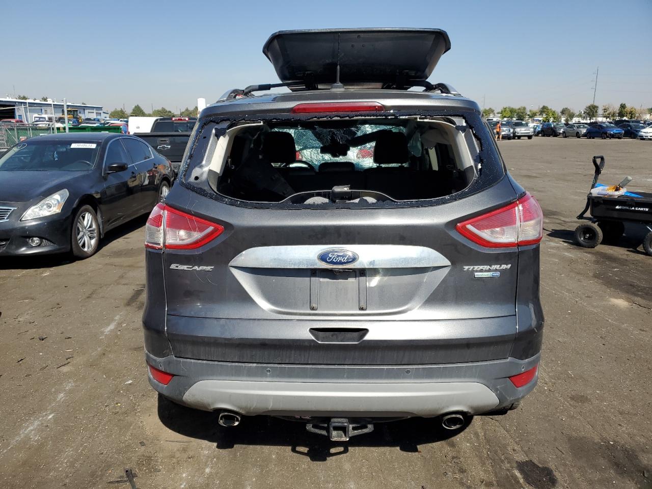 2015 Ford Escape VIN 1FMCU9J93FUC12570 Copart auction photo, all over damage thumbnail 6