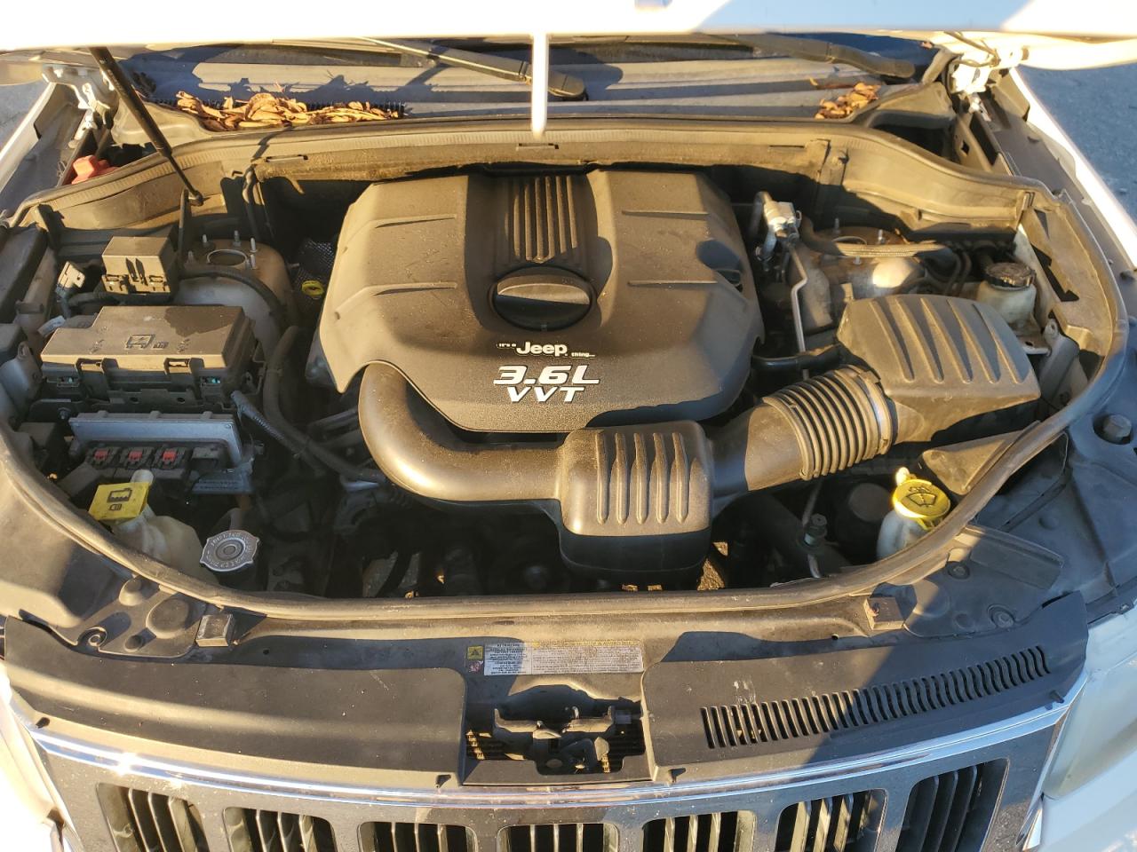 2012 Jeep Grand Cherokee VIN 1C4RJEAG0CC137438 Copart auction photo, side damage thumbnail 13