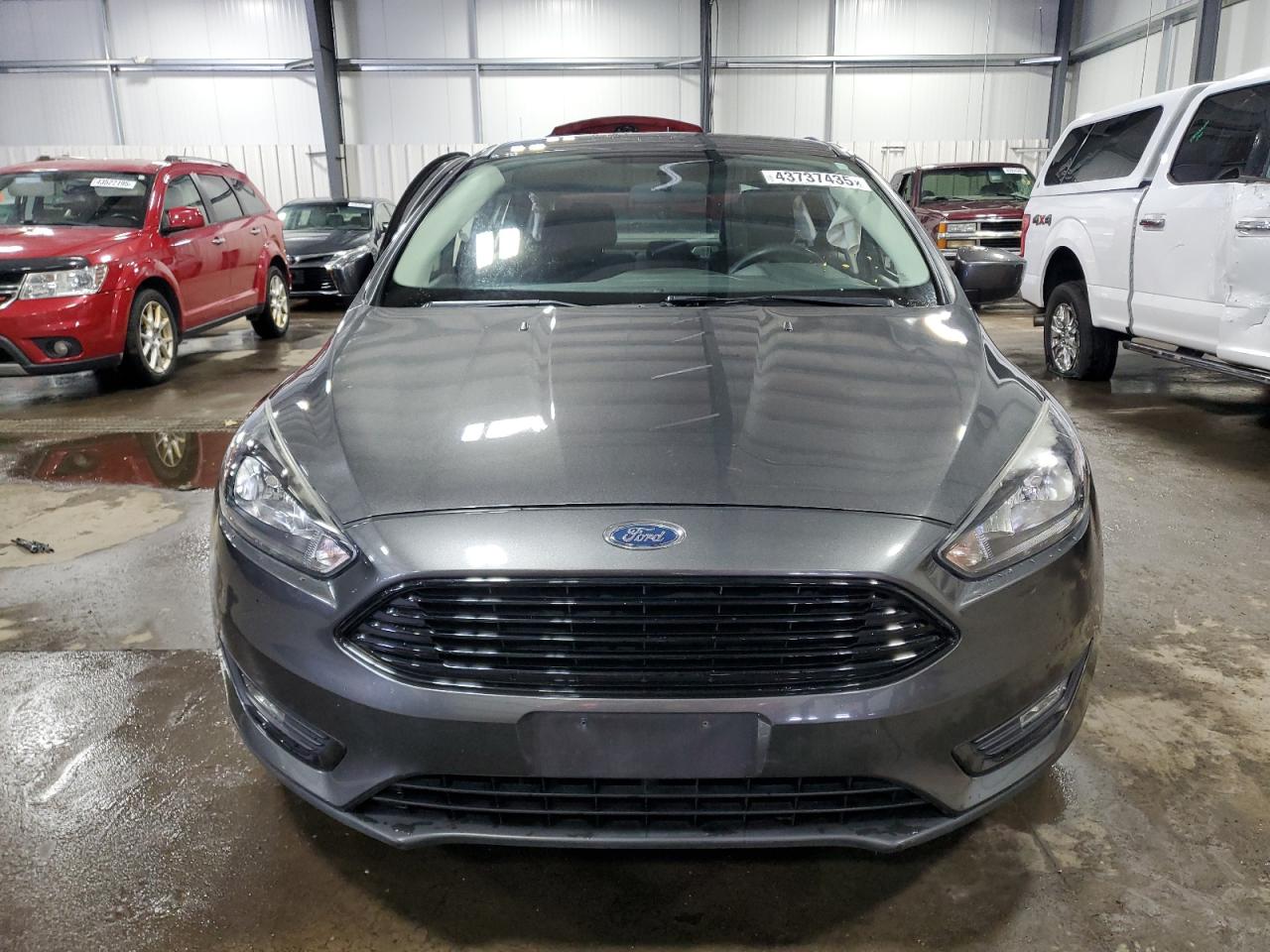 2018 Ford Focus VIN 1FADP3FE5JL244587 Copart auction photo, side damage thumbnail 5