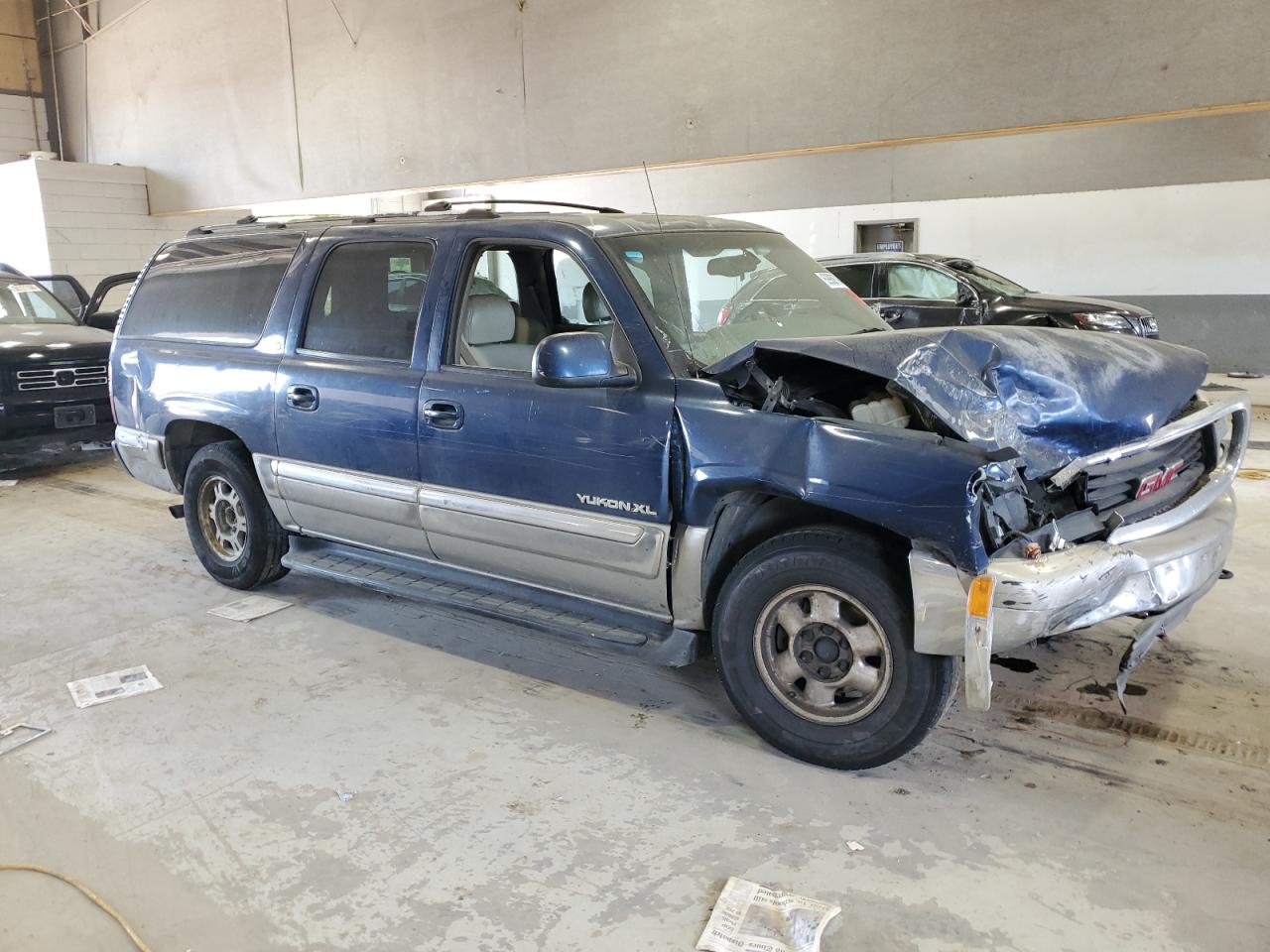 2000 GMC Yukon VIN 1GKFK16T1YJ125157 Copart auction photo, front end / rear end damage thumbnail 4