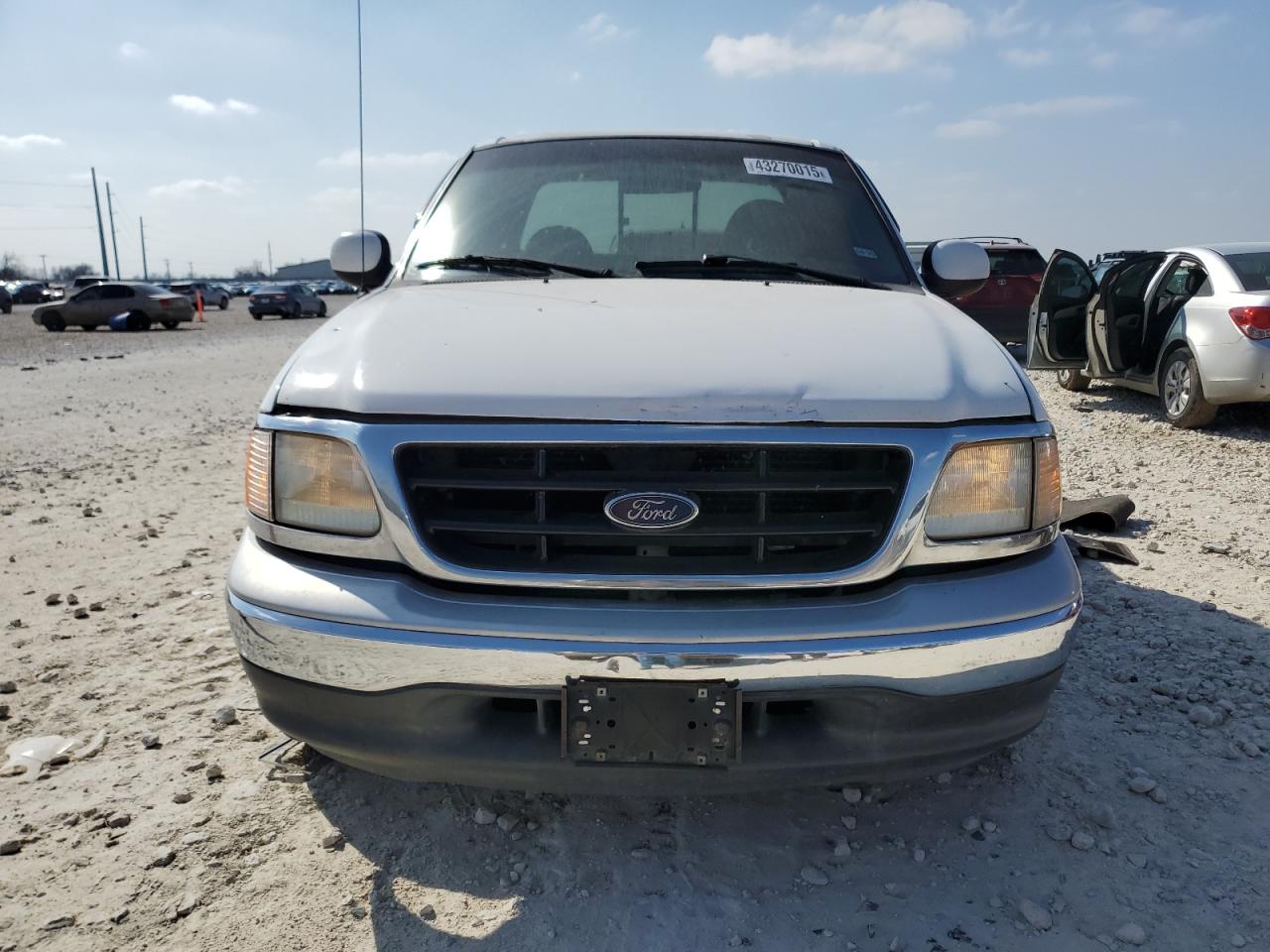 1999 Ford F250 VIN 1FTRX27L8XKA26097 Copart auction photo, side damage thumbnail 5