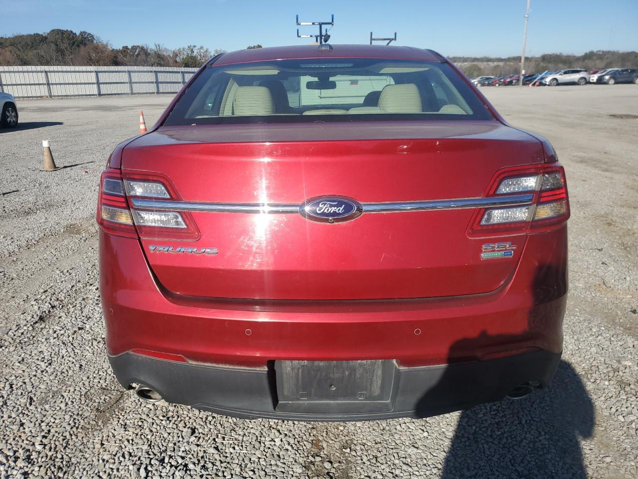 2015 Ford Taurus VIN 1FAHP2H83FG194761 Copart auction photo, burn / rear end damage thumbnail 6