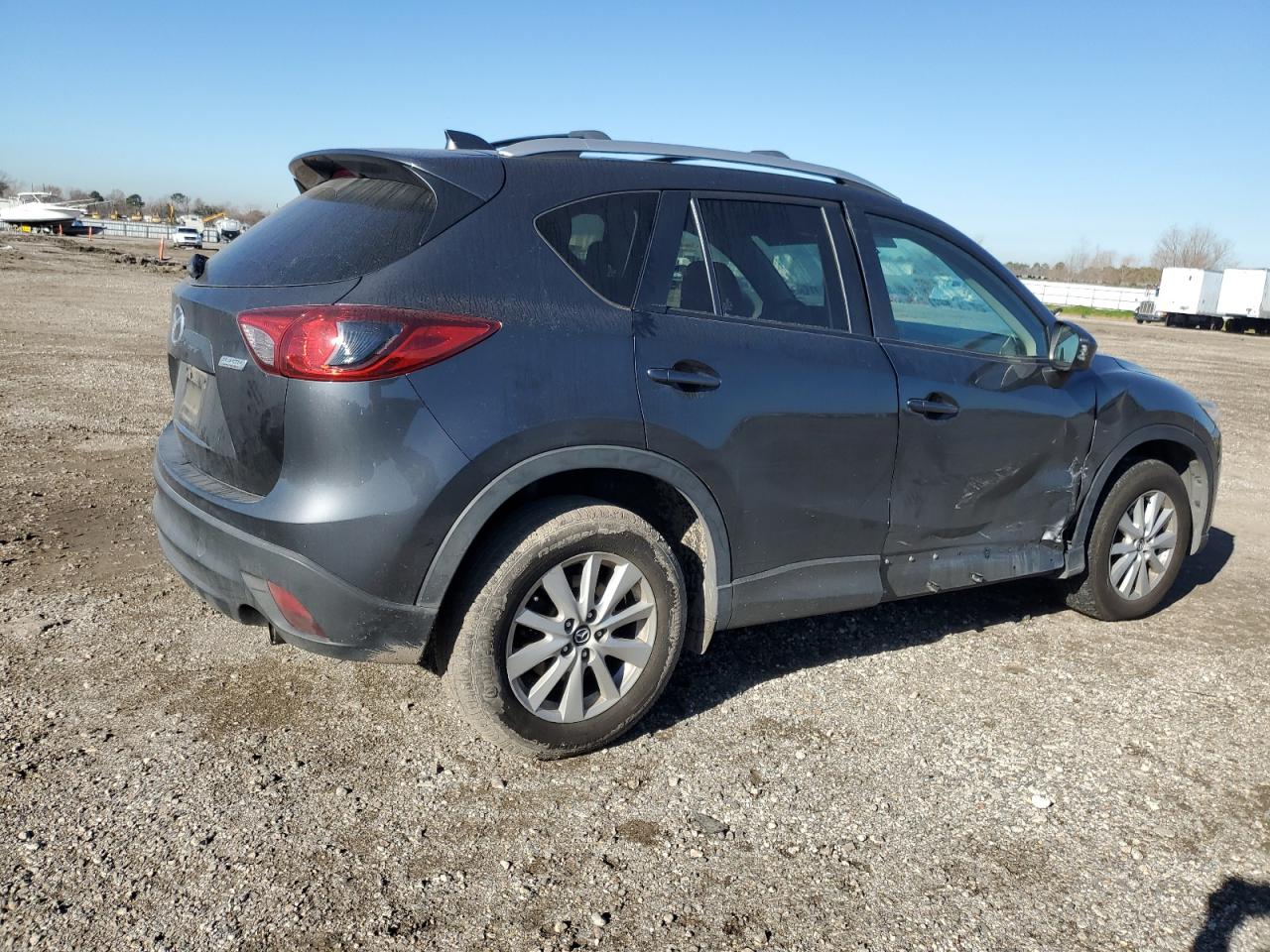 2014 Mazda CX-5 VIN JM3KE4CY7E0330249 Copart auction photo, side / minor dent/scratches damage thumbnail 3