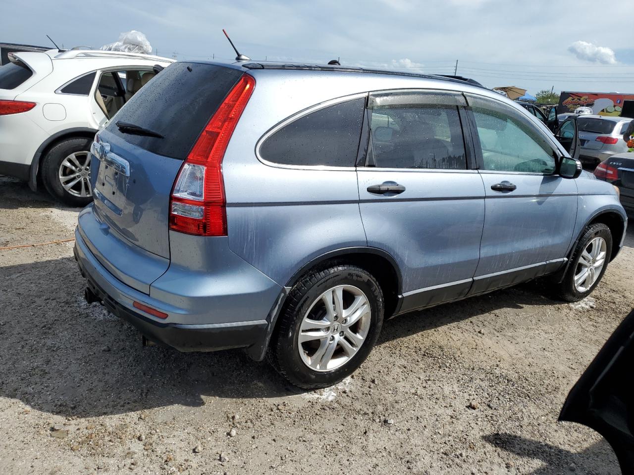 2010 Honda CR-V VIN 3CZRE3H57AG702494 Copart auction photo, water/flood damage thumbnail 3