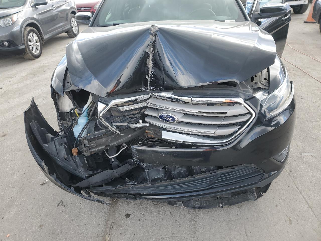 2013 Ford Taurus VIN 1FAHP2E87DG220182 Copart auction photo, front end damage thumbnail 11