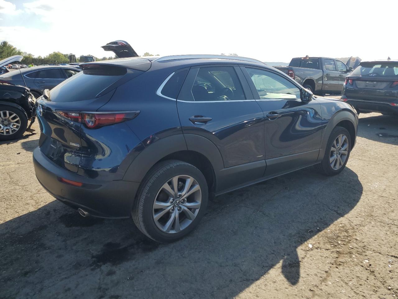 2022 Mazda CX-30 VIN 3MVDMBCL7NM454630 Copart auction photo, front end / side damage thumbnail 3