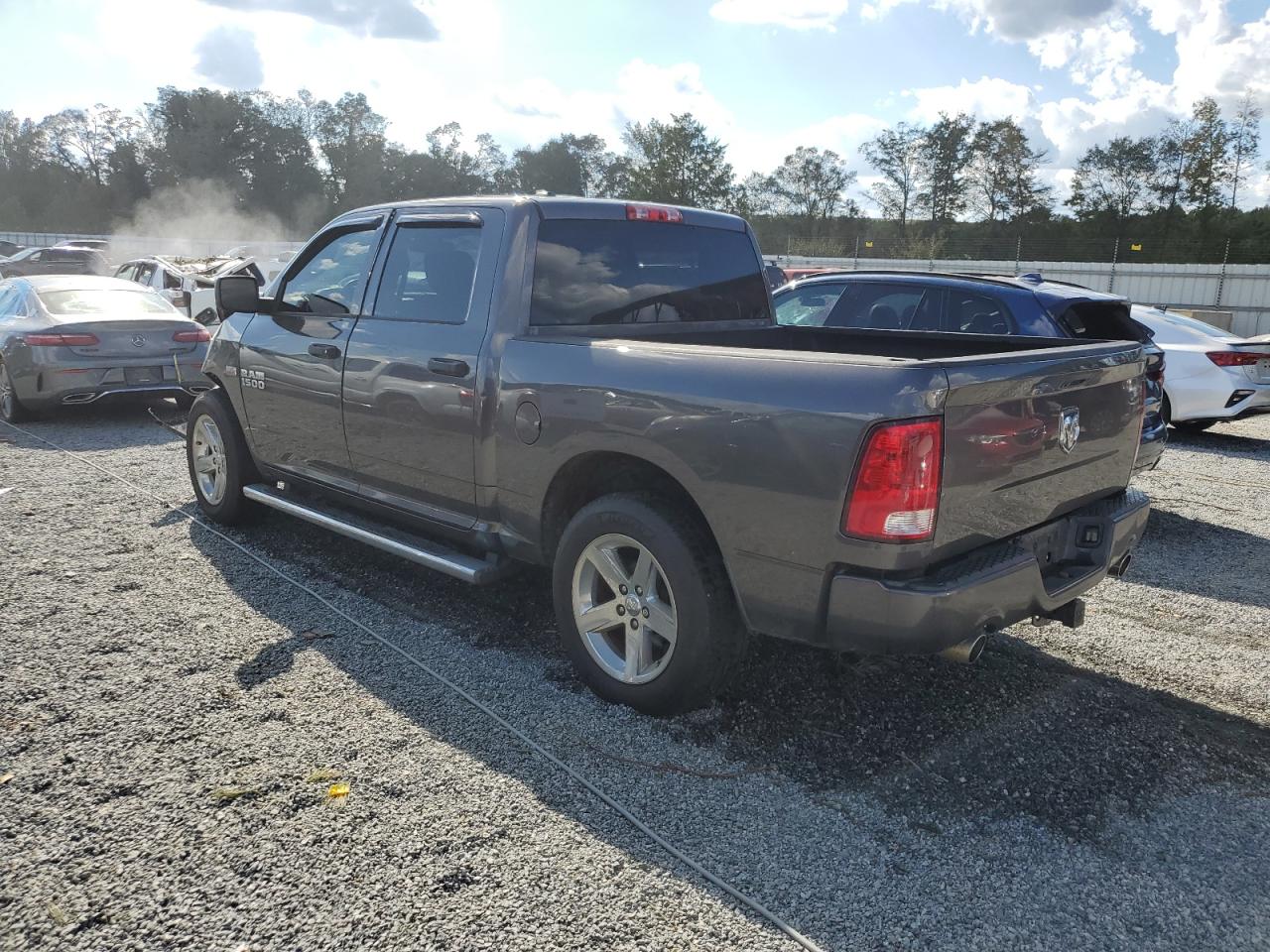 2015 RAM 1500 VIN 1C6RR6KT1FS709340 Copart auction photo, front end / side damage thumbnail 2