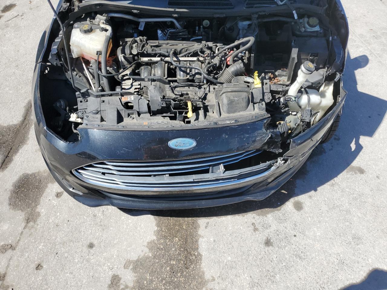2015 Ford Fiesta VIN 3FADP4AJ3FM107499 Copart auction photo, front end / side damage thumbnail 11