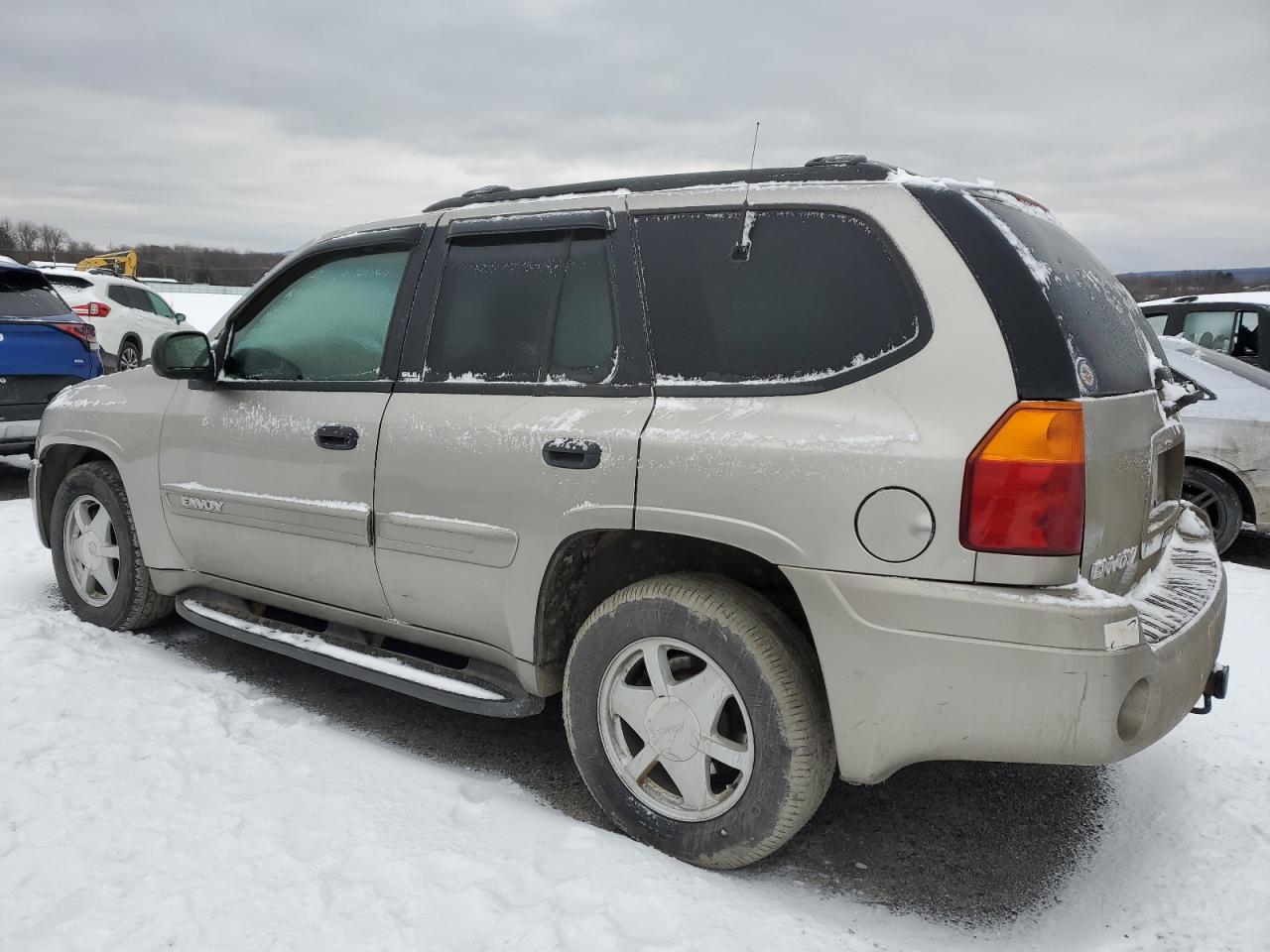 2002 GMC Envoy VIN 1GKDT13S722133619 Copart auction photo, front end / minor dent/scratches damage thumbnail 2