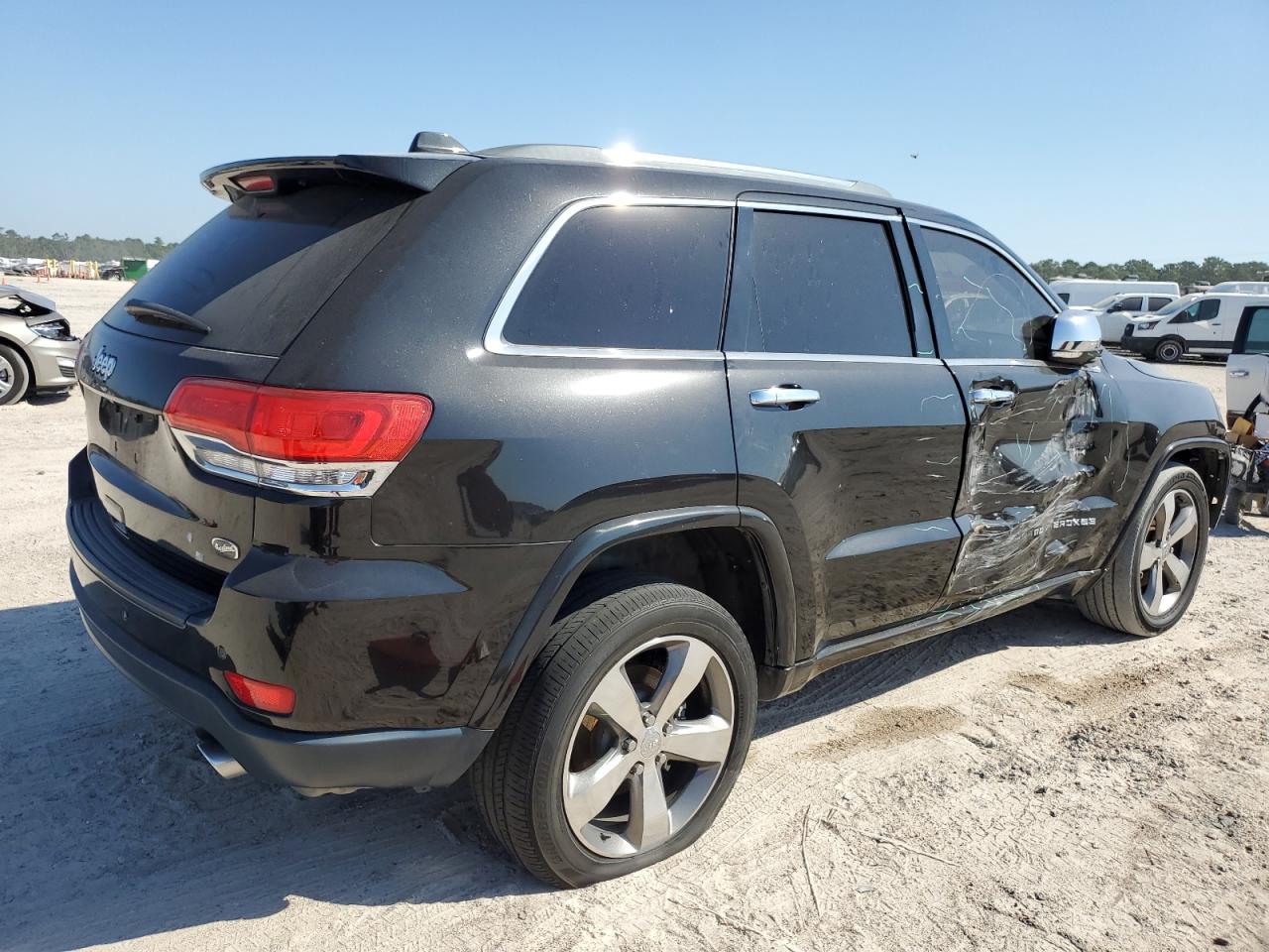 2015 Jeep Grand Cherokee VIN 1C4RJECG3FC808084 Copart auction photo, front end / side damage thumbnail 3