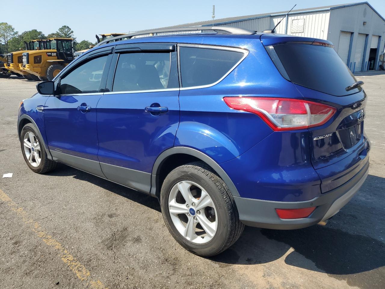 2015 Ford Escape VIN 1FMCU9G9XFUB97220 Copart auction photo, side damage thumbnail 2