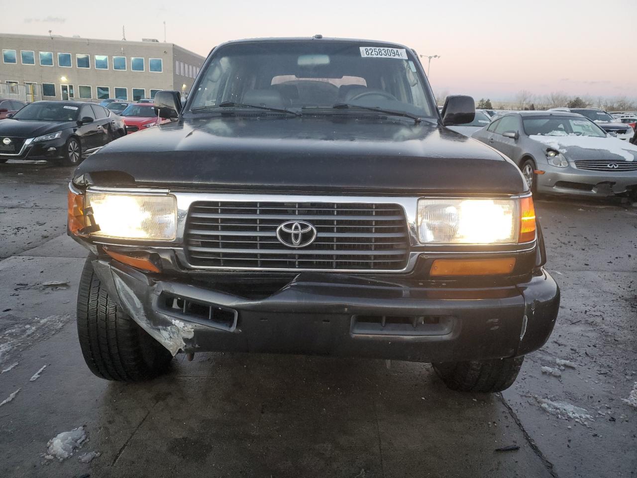 1997 Toyota Land Cruiser VIN JT3HJ85J7V0156824 Copart auction photo, front end damage thumbnail 5