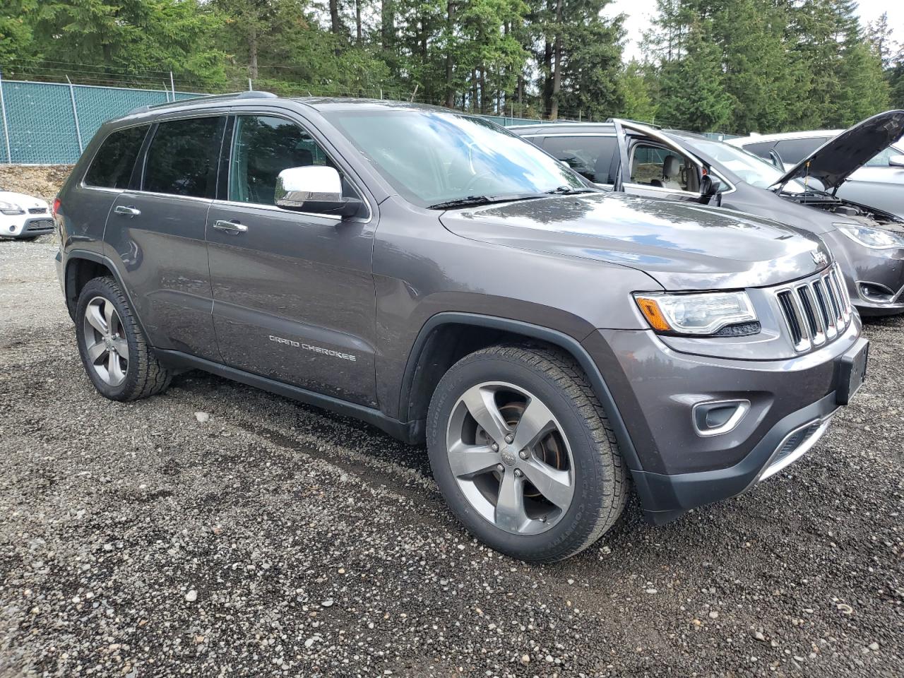 2014 Jeep Grand Cherokee VIN 1C4RJEBM7EC322397 Copart auction photo, minor dent/scratches damage thumbnail 4