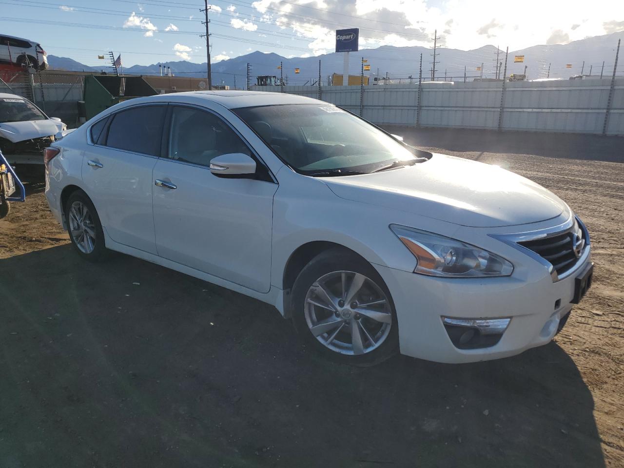 2015 Nissan Altima VIN 1N4AL3AP9FN864250 Copart auction photo, vandalism / minor dent/scratches damage thumbnail 4