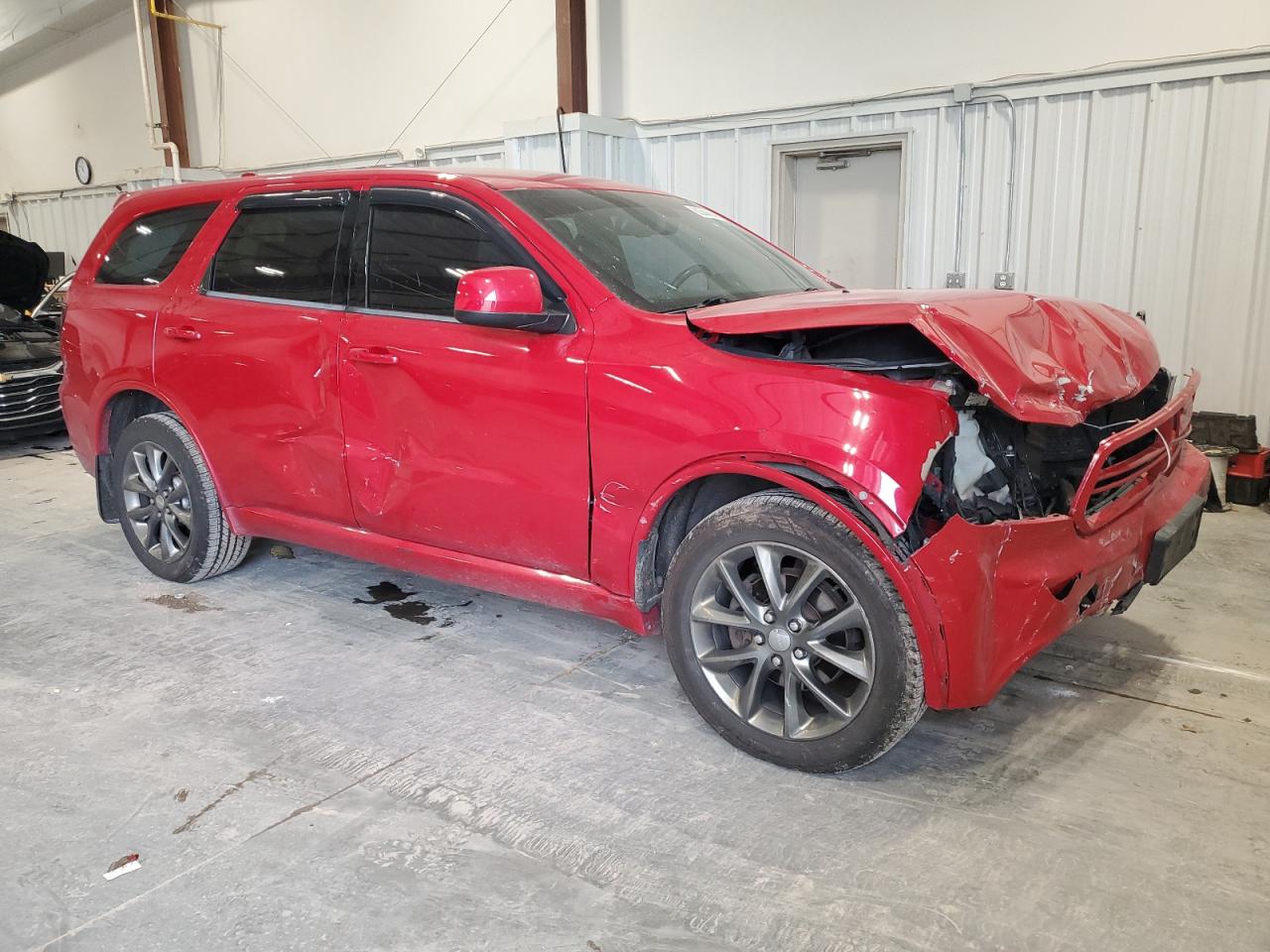2015 Dodge Durango VIN 1C4RDJAG8FC702944 Copart auction photo, front end / side damage thumbnail 4