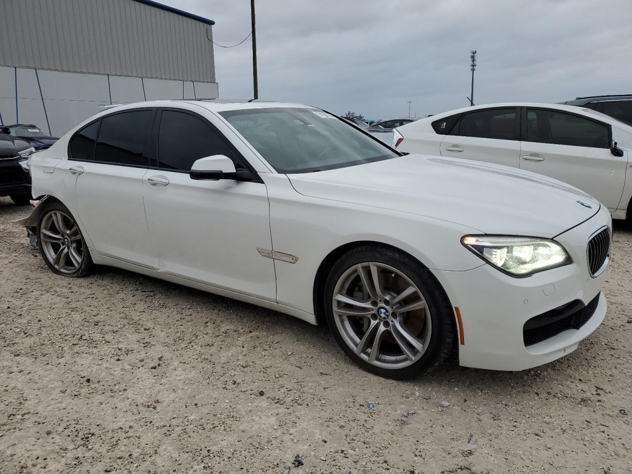 2013 BMW 7er VIN WBAYA8C54DC996569 Copart auction photo, rear end damage thumbnail 4