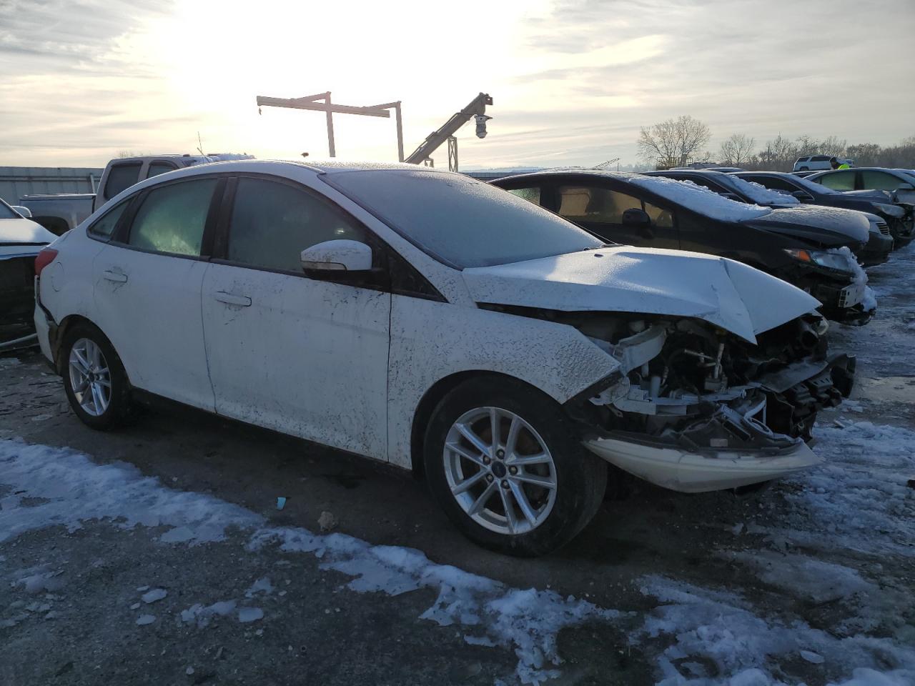2016 Ford Focus VIN 1FADP3F24GL214088 Copart auction photo, front end / rear end damage thumbnail 4