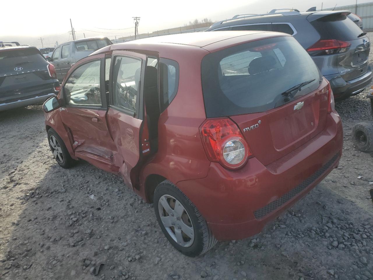 2009 Chevrolet Aveo VIN KL1TD66EX9B308065 Copart auction photo, side / front end damage thumbnail 2