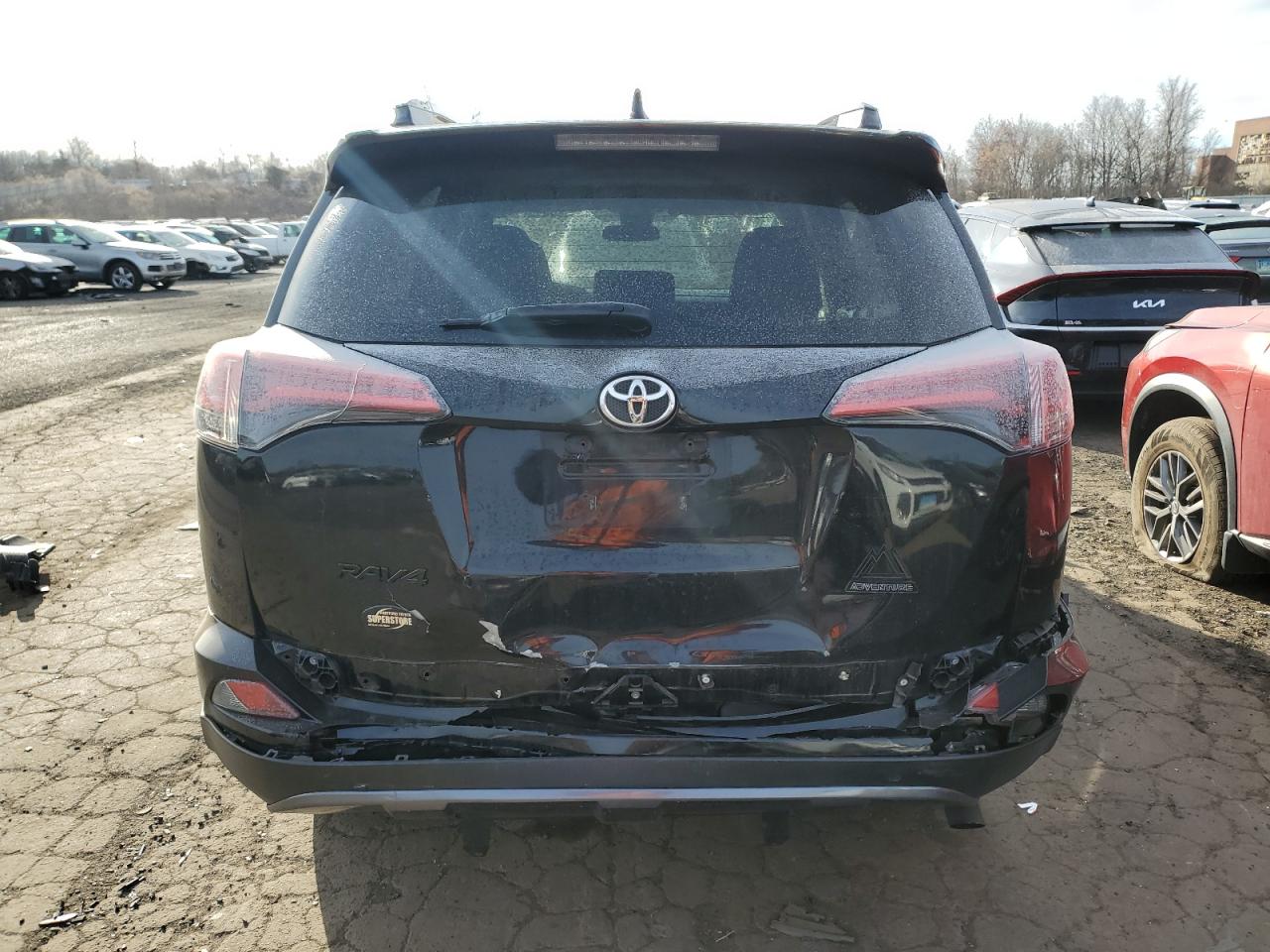 2018 Toyota RAV 4 VIN 2T3RFREV6JW774815 Copart auction photo, front end / rear end damage thumbnail 6